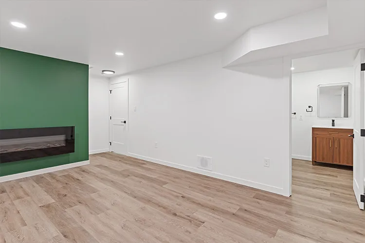 insurance-flood-restoration-04-finished-basement-rebuild-vinyl-plank-flooring